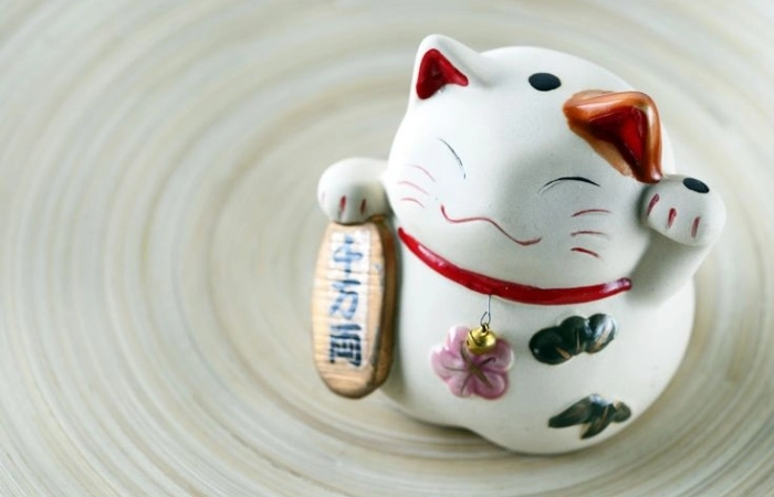 Mèo thần tài may mắn biểu tượng giúp gia chủ làm ăn thuận lợi