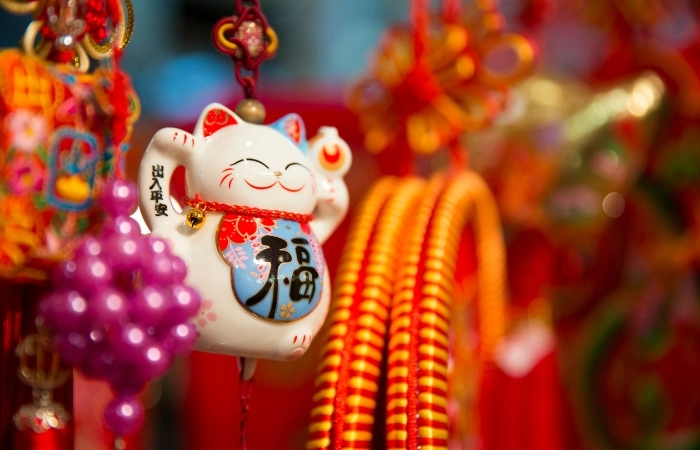 Mèo tài lộc vẫy tay giúp thu hút tiền tài, phát triển kinh doanh
