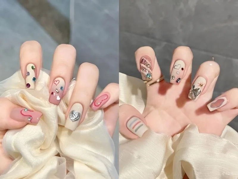 Mẫu móng tay đính đá nhẹ nhàng nữ tính và sang trọng
