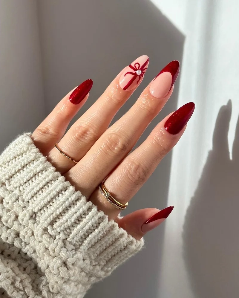 Điệu đà với nail đỏ nơ giúp bạn trở nên duyên dáng hơn