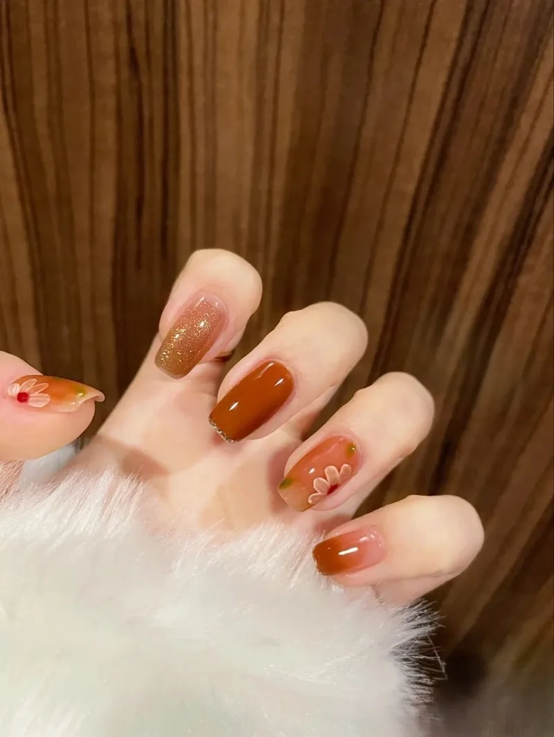 Móng tay màu cam thạch mang lại vẻ ngoài nhẹ nhàng và tinh tế