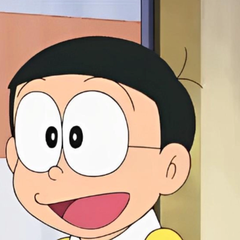 Nobita cười meme thể hiện những tình huống hài hước từ nhân vật nổi tiếng Doraemon