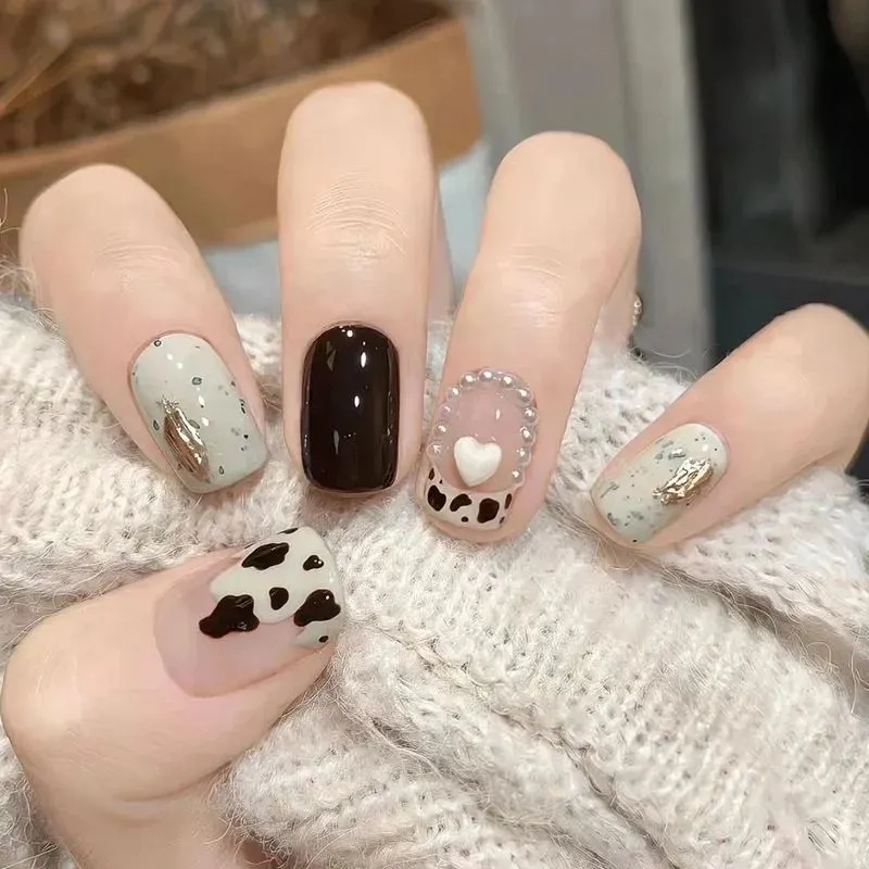 Đưa vẻ đẹp vào từng chi tiết với mẫu nail hình bò sữa