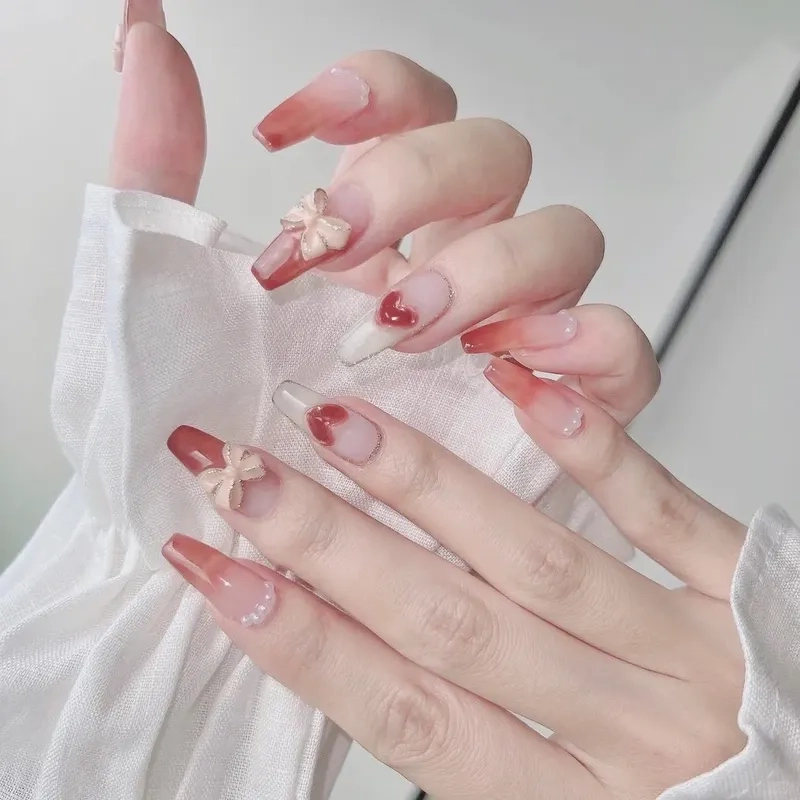 Làm mới đôi tay với nails đính nơ tạo điểm nhấn hoàn hảo