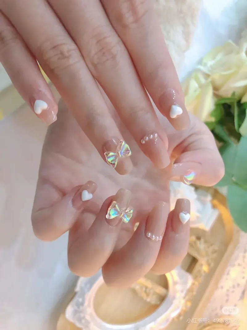 Cảm nhận vẻ đẹp dịu dàng với nơ gắn móng độc đáo