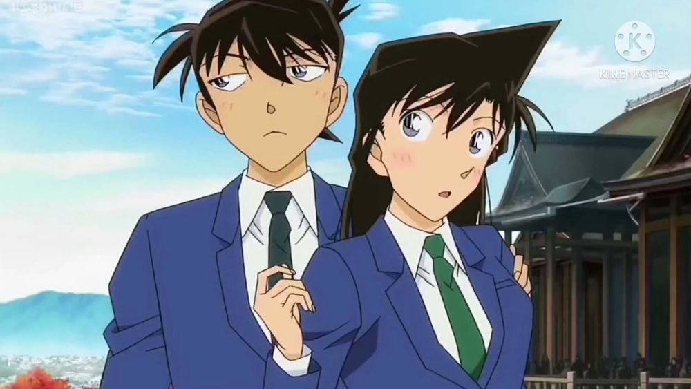 Shinichi hôn Ran trong khung cảnh lãng mạn dưới mưa